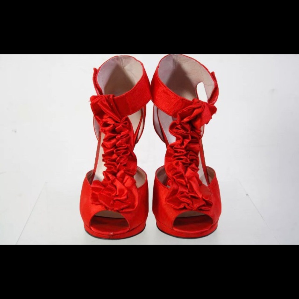 Besty Johnson red high heels